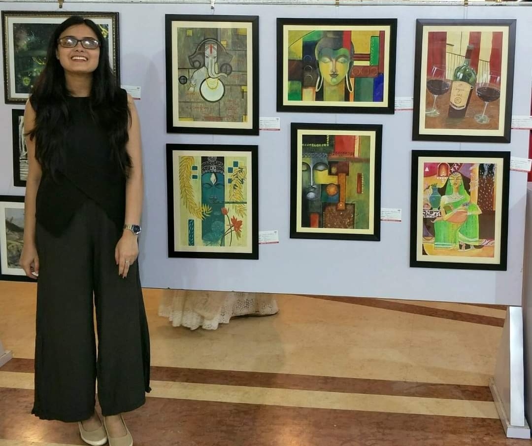 Gauri Bharadwaj with her paintings