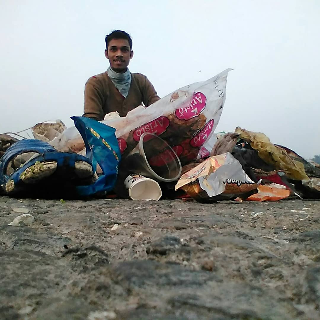 Akshay Sandeep Patil with garbage collected from River