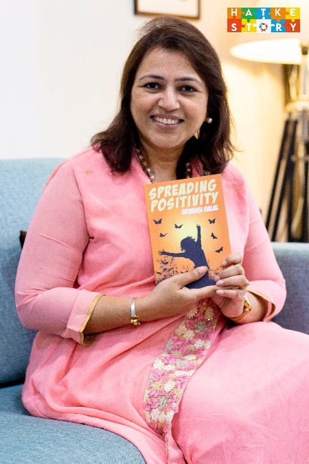 Devangi Dalal with her book Spreading Positivity