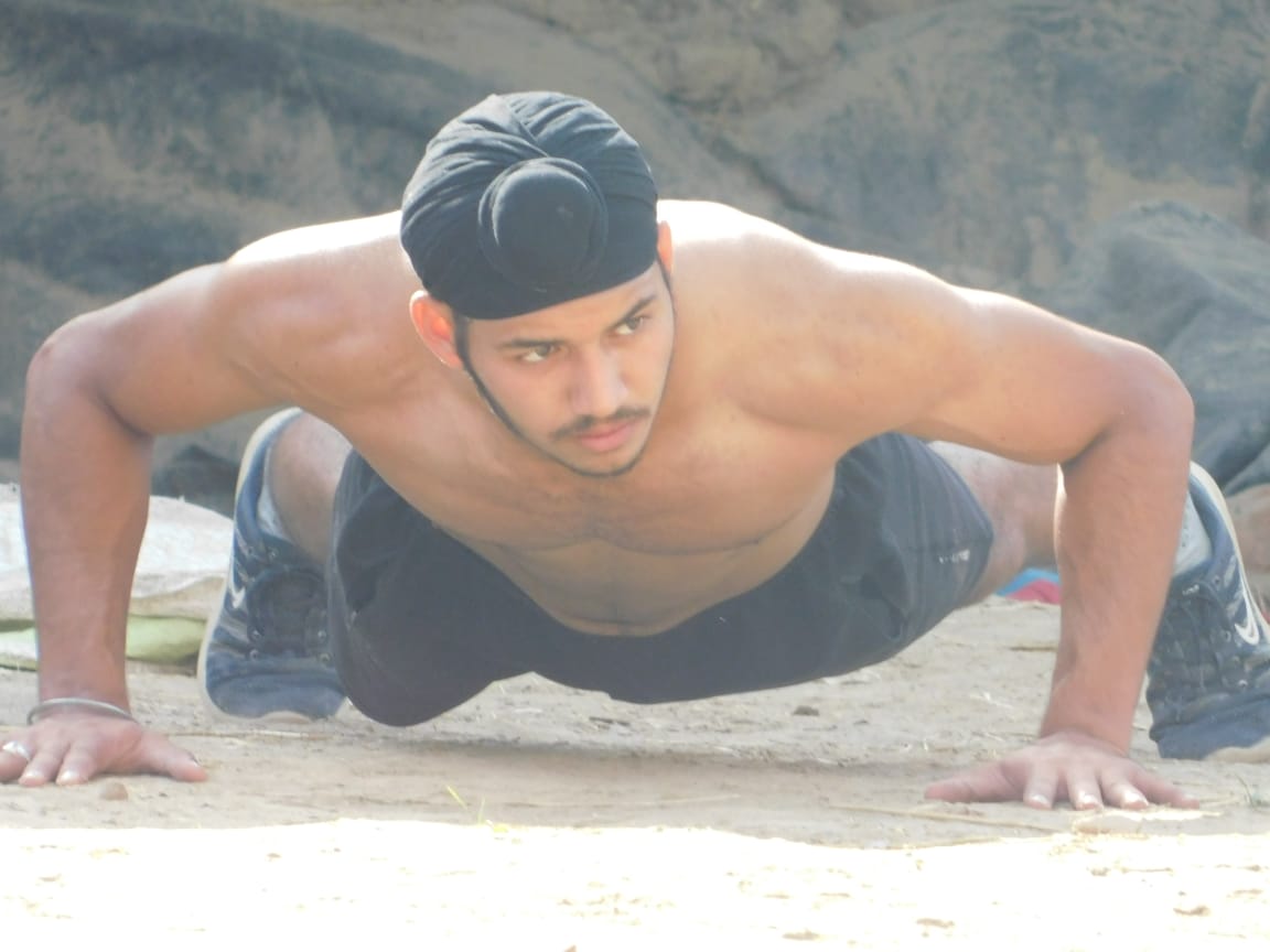 Kuwar Amritbir Singh doing pushups