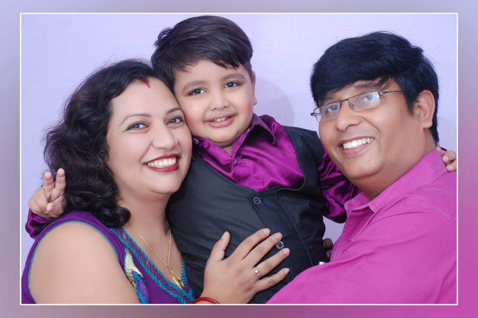 Avi Sharma with his parents