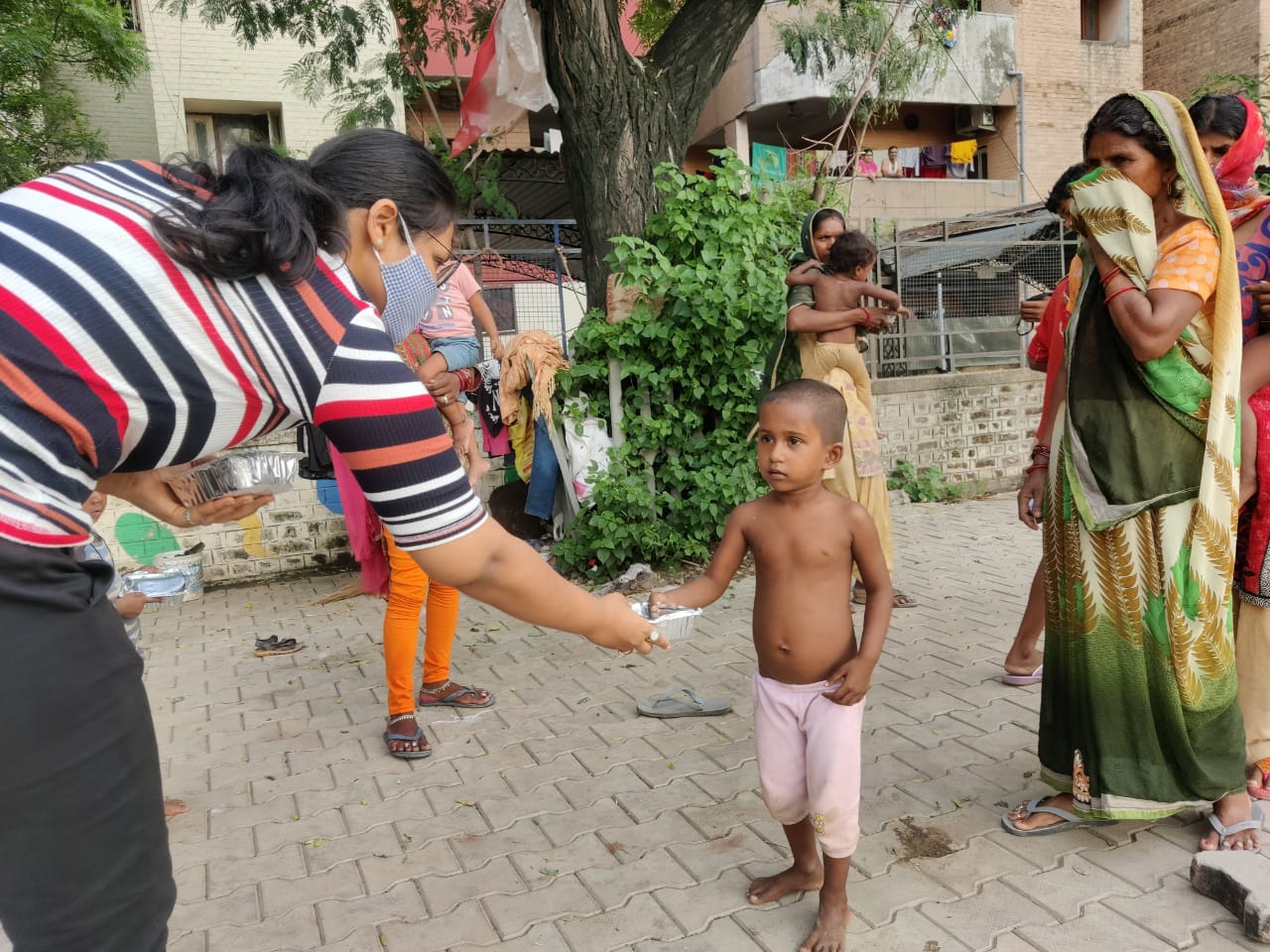 Ashray India distributing food